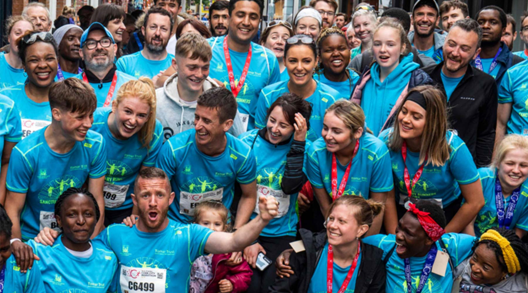 Sanctuary Runners Group After Completing Marathon